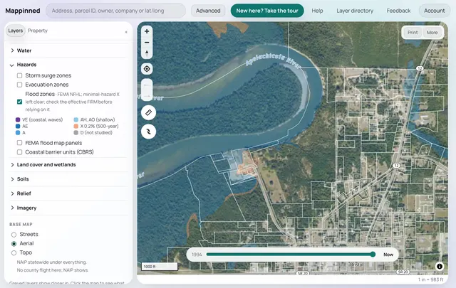 Flood zones over an aerial photo along the Apalachicola River, the parcel lines on top